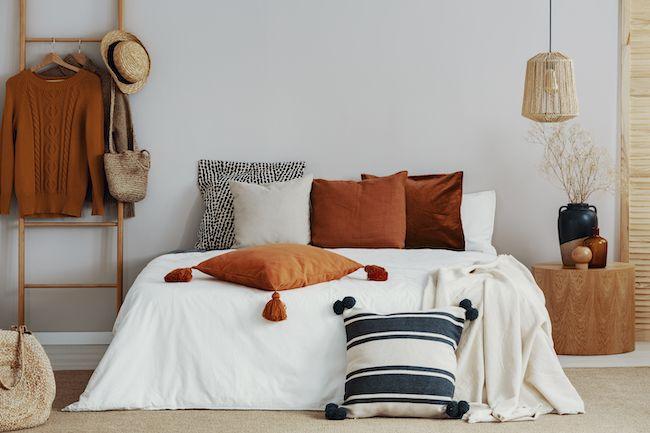 Cozy bedroom with fall decor.